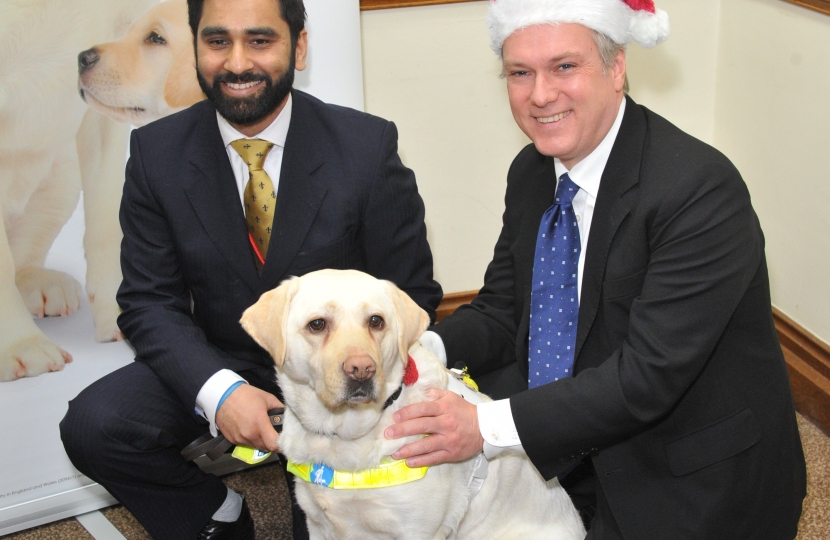 MP gets a visit from Guide Dog's Santa Paws this Christmas