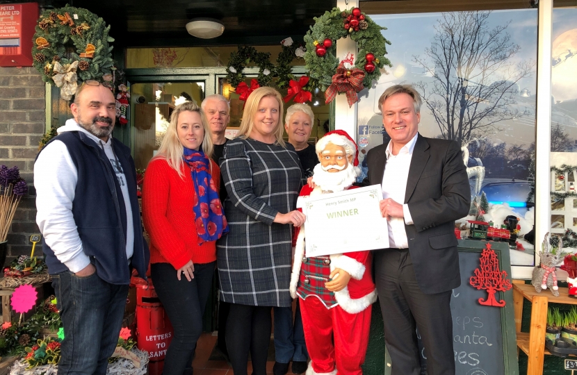 Henry Smith MP congratulates Festive Crawley Christmas Shop Window Winner